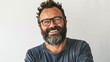 Friendly face portrait of an authentic caucasian bearded man with glasses of toothy smiling dressed casual against a white wall isolated hyper realistic 