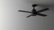   A close-up of a ceiling fan with a single light bulb in its center and another light mounted on the ceiling above
