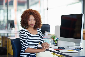 Poster - African woman, portrait and business at desk in office for work, computer and online company. Female person, creator and creative designer at workplace for web developer, website and coding.