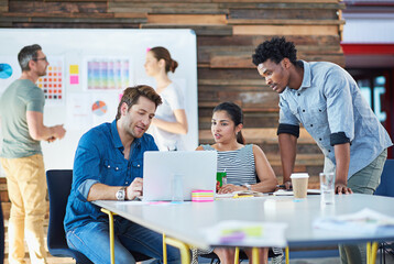 Business people, laptop and meeting in office brainstorming for online plan, innovation and diversity talk. Teamwork, communication and tech with digital schedule for group project or collaboration