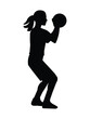 Black girl silhouette of a women's basketball player who stands and holds the ball with both hands
