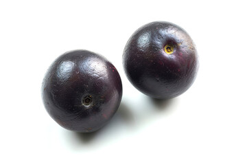 two acai berries, top view, vivid and distinct on a white background 