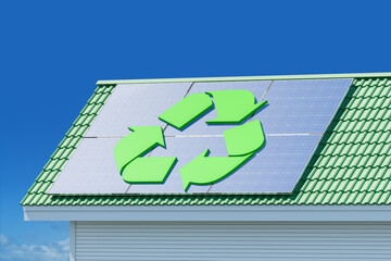 Wall Mural - House roof with a recycling symbol on solar panels, bue sky