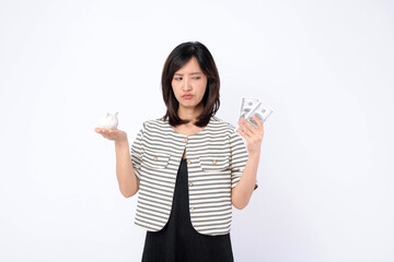 Poster - young beautiful business asian woman with a lot of cash money and piggy bank isolated on white background. Wealth money saving, finance investment concept.