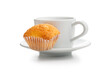 Magdalenas the typical spanish plain muffins and coffee cup isolated on white background.
