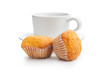 Magdalenas the typical spanish plain muffins and coffee cup isolated on white background.