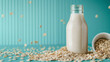 Close up bottle of oatmeal milk surrounded by oatmeal nearby on a table on a идгу light background with copyspace