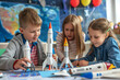 © Ekaterina Shvaygert - A group of school students building a model of a space rocket