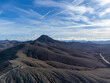 Panoramic view on colourful remote basal hills and mountains of Massif of Betancuria as seen from observation point, Fuerteventura, Canary islands, Spain