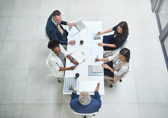 Wall Mural - From above, business people or discussion in office meeting for partnership, collaboration or corporate deal. Workplace, boardroom or team with documents for agreement, project or working