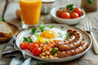 tasty healthy breakfast, fried egg , sausage, baked beans, and tomatoes on plate, glass of orange juice on kitchen table