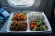 Serve Food. Asian Cuisine Meal Served on a Flight Journey