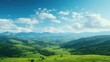 Panoramic view of green hills with clouds and blue sky seen from the plateau. Summer background.
