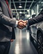 Two businessmen shaking hands in a car dealership.