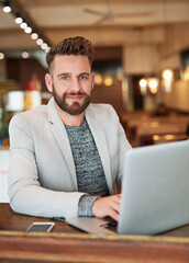 Poster - Businessman, portrait and laptop in coffee shop for email, conversation and communication with client. Male person, technology and remote work in cafe for brainstorming, idea and planning for project