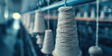 Fototapeta  - Closeup bobbin thread cones on a warping machine, textile mill. Making Balls of Yarn in factory. Textile industry, spools on spinning machine.