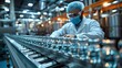 A medical lab technician meticulously inspects medical vial bottles on a mass production conveyor belt in a pharmaceutical warehouse