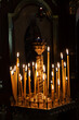 Christian Orthodox Church. Orthodox Church on the day of the Resurrection of Christ. Christianity. The church lit candles at icon. Burning candle. The inscription in Russian is CHRIST. Easter holiday