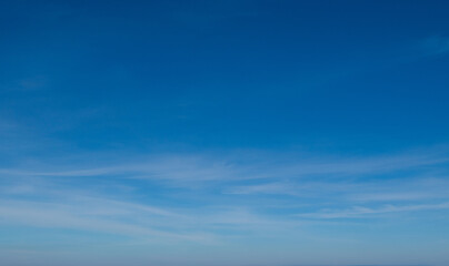 Wall Mural - blue sky with cloud white background. Clearing day clear soft cloud in sunshine