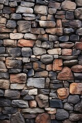 Canvas Print - A close-up of a stone wall with different colors and shapes of stones.