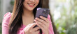Portrait of smiling happy asian woman relax using digital smartphone.Young asian girl working or study,chatting social network and playing game online or social media,shopping online at home