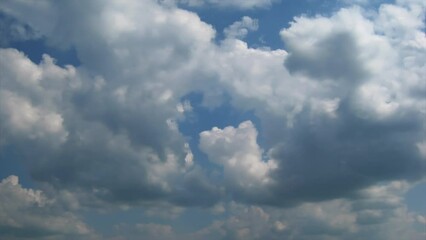 Wall Mural - Sky background with clouds moving, time lapse 4k