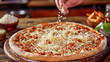 hand sprinkles grated cheese on a deliciously appetizing pizza