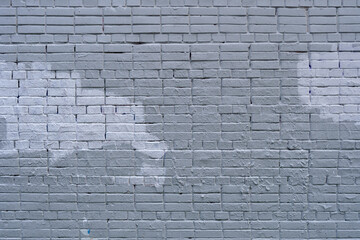 Wall Mural - The old wall is unevenly painted. Abstract construction background.