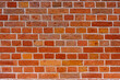 Old red brick wall. Abstract construction background.