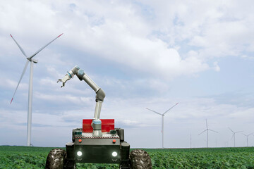 Aufkleber - Autonomous robot harvester with robotic arm is working on a field with wind turbines.