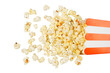 © panadesignteam - Salted popcorn spilling out of red and white cardboard box used as a border frame