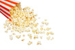 © panadesignteam - Salted popcorn spilling out of red and white cardboard box used as a border frame