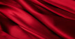 Red satin cloth waves background texture