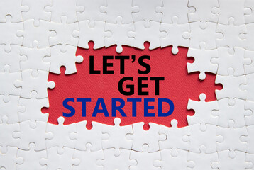 Wall Mural - lets get started symbol. concept words lets get started on white puzzle. beautiful red background. b