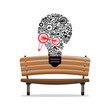 Lightbulb made from cogs - gears on bench, vector