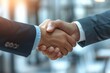 Business people in office suits standing and shaking hands, close-up. Business communication concept. Handshake and marketing.