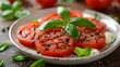 Bowl of Tomatoes and Basil on Table