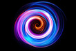 Enchanting neon swirls twirling in a whirlwind of vibrant colors. Abstract art on black background.