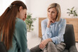 © New Africa - Professional psychotherapist working with patient in office