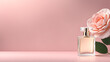 © Jati - A bottle of perfume is on a table next to a rose