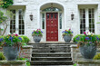 Front steps of stone fronted house with flowers