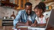 © Sasint - An engaged father helping his daughter with homework at the kitchen table, showing patience and guidance