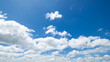 clear blue sky background,clouds with background, Blue sky background with tiny clouds. White fluffy clouds in the blue sky. 
Captivating stock photo featuring the mesmerizing beauty of the sky and cl