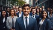 © ORG - multicultural businessman outdoors Large group of smiling people wearing formal clothes on city street.