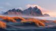 A photograph of the majestic Vestrahorn mountain range in Iceland. Created with Ai