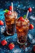 Iced cola with strawberries and mint garnish. High-angle shot with copy space.