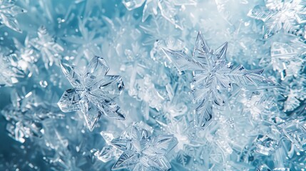 A crystal motif in ice blue and silver on a clear, frost-like ice background.