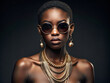 Beautiful afro american woman in sunglasses and golden jewelry. beauty fashion girl