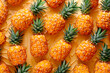 Fresh yellow pineapples on bold colored background