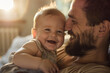 © ink drop - Close up of a new dad holding their young baby. Fatherhood and fathers day concepts